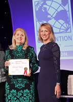 Deborah Bauer receives the 2017 CREW Impact Award for Entrepreneurial Spirit.